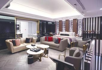 H Motel                         has rooms with a private hot tub