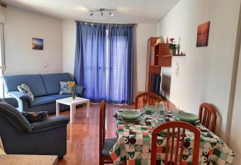 Apartamento playero con vistas a la monta  a has Balcony rooms