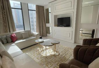 Amwaj Luxury Apartment has rooms with a private hot tub