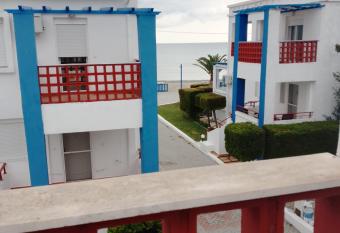 White house on the Beach has Balcony rooms