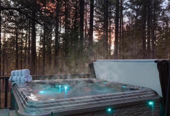 A-Frame Mountain Cabin w Views, Deck, Fireplace, BBQ & Spa has rooms with a private hot tub