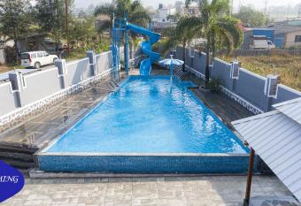 Royal Retreat - 7BHK Luxury Villa has rooms with a private hot tub