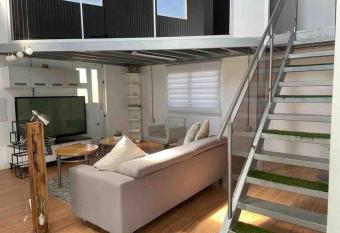 Centric Rustic Modern Downtown Executive Pad has Balcony rooms
