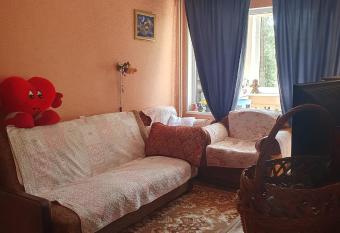 One room , next to the beach with a balcony shared toilet and kitchen . has Balcony rooms