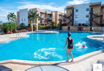 Moderno y acogedor apartamento con piscina (comp) has Balcony rooms