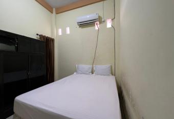 SPOT ON 92547 Wisma Dg Tata allows 18 year olds to book a room