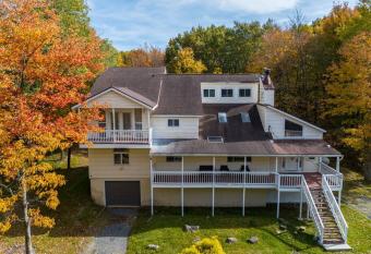 Spacious Poconos Retreat at a Perfect location! has rooms with a private hot tub