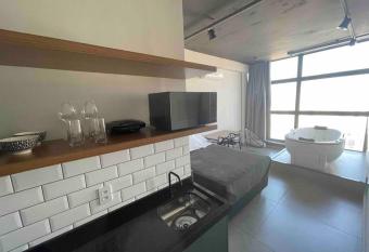 Sky Loft - Andar 41 has rooms with a private hot tub