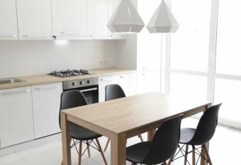 White Apartment Melnyka10 has Balcony rooms