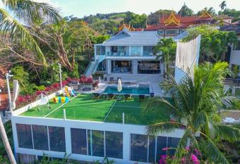 Luxury 5 Bed Private Pool Villa with Ocean View (PTG2) has rooms with a private hot tub