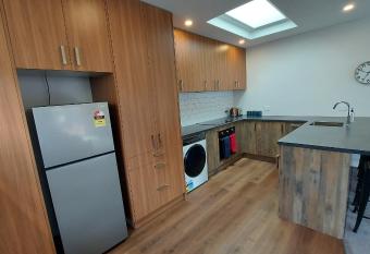 Sleek Suite by the Sand (2 bedroom) allows 18 year olds to book a room