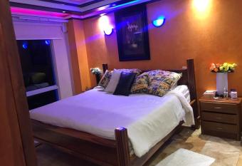 Luxury penthouse style has rooms with a private hot tub