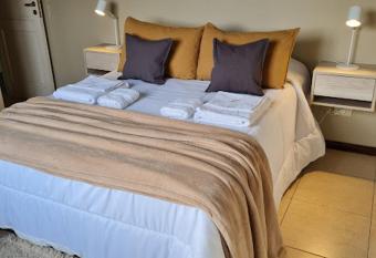 Buona Vita Departamento Alto Dorrego - Mendoza has Balcony rooms