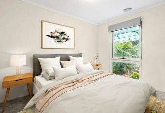 Beautiful traditional vacation house has rooms with a private hot tub