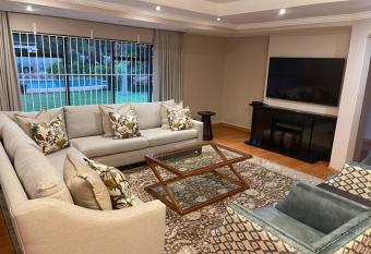 A pristine guesthouse in an upmarket peaceful suburb - 2106 has Balcony rooms