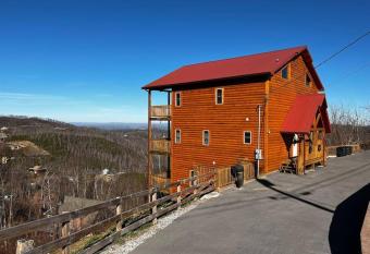 * 3 Master BR, Views, Theater, Arcade, Pinball has rooms with a private hot tub