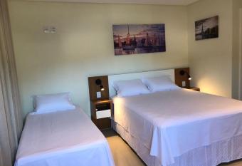 Pousada Louren  o has rooms with a private hot tub