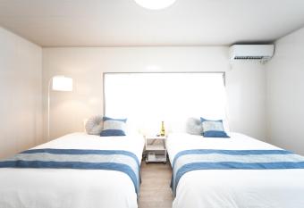 Yokkaichi Kawaramachi Hotel has rooms with a private hot tub