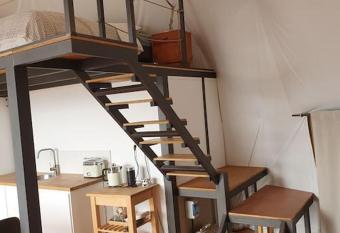 Glamping geodesic dome in secluded eco retreat has rooms with a private hot tub