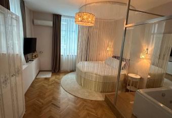 Luxury apartment with Jacuzzi has rooms with a private hot tub