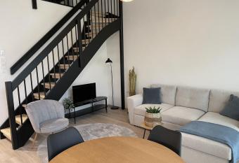 High-ceilinged apartment with balcony has Balcony rooms