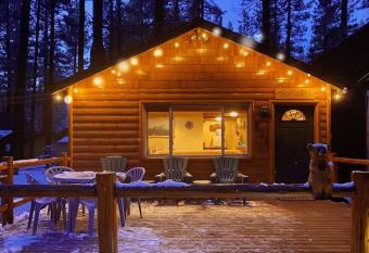 Two Bedroom Log Cabin has rooms with a private hot tub