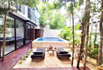 Supreme Jungle Holiday Home in Tulum - Private Pool has rooms with a private hot tub