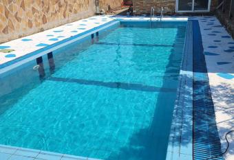 Private Pool Villa in Nea Kallikrateia has rooms with a private hot tub