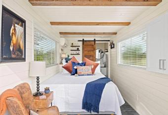 New The Perry Cozy Container Home allows 18 year olds to book a room