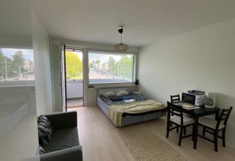 A bright apartment near metro with a balcony has Balcony rooms