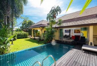 3-Bedroom Tropical Pool Villa has rooms with a private hot tub