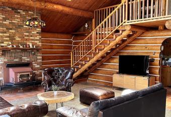 Island Log Cabin with Ocean View & Organic Garden allows 18 year olds to book a room