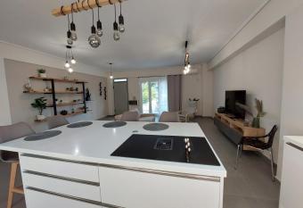 New minimal apartment,10  from Athens airport has Balcony rooms