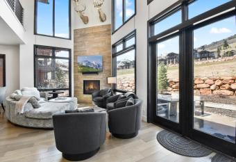 Luxury townhome on golf course with private firepit and BBQ grill Walk to hiking and biking trails has rooms with a private hot tub