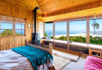 Casa c  lida de relajo en Tunqu  n (Campomar) has Balcony rooms