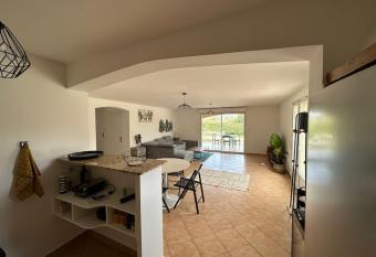 Grande annexe de maison avec jardin has Balcony rooms