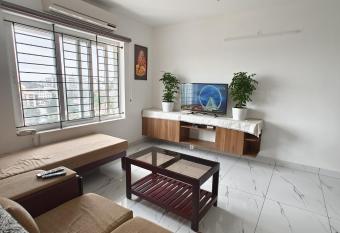 Luxurious Apartment with a pool and gym near Trivandrum railway station has Balcony rooms