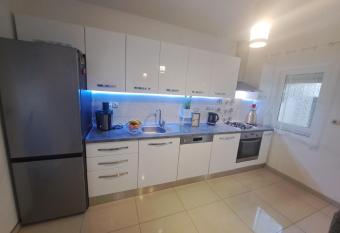 Two bedrooms comfort apartman with big yard kids friendly, free WIFi, free parking has rooms with a private hot tub