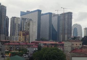 apartament has rooms with a private hot tub