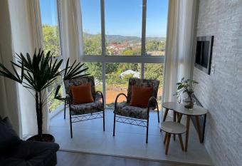 Aconchego na Serra - Nova Petr  polis has Balcony rooms