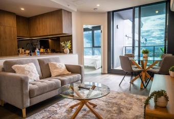 Luxe Apt with Infinity Pool & Parking Space has rooms with a private hot tub