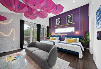 The PiinK Flamingo    InstaWorthy Murals    HotTub has rooms with a private hot tub