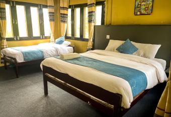 Hotel Tharu Garden And Beer Bar has rooms with a private hot tub