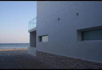 Casa en la orilla de la playa has Balcony rooms