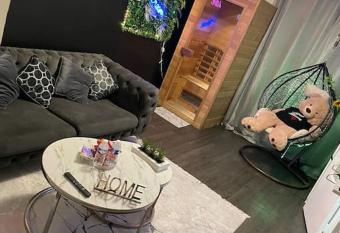 Spa detente avec jacuzzi et sauna has rooms with a private hot tub