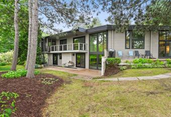 Modern Style Lakefront Retreat has Balcony rooms