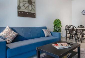 PRIME LOCATION 2 Bedroom Beach Front (Side View) has rooms with a private hot tub