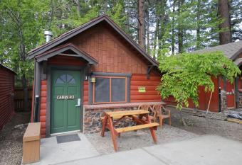 Cozy Village Hideaway - Cabin #43 has rooms with a private hot tub