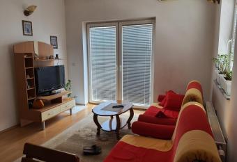 ZOGU Apartments - City View has rooms with a private hot tub