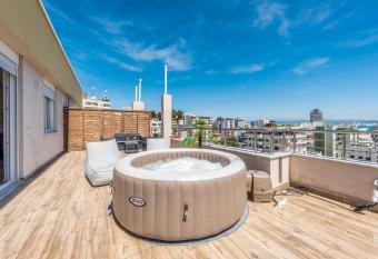 Luxury Seaview Apartment with Big Terrace and Jacuzzi has rooms with a private hot tub